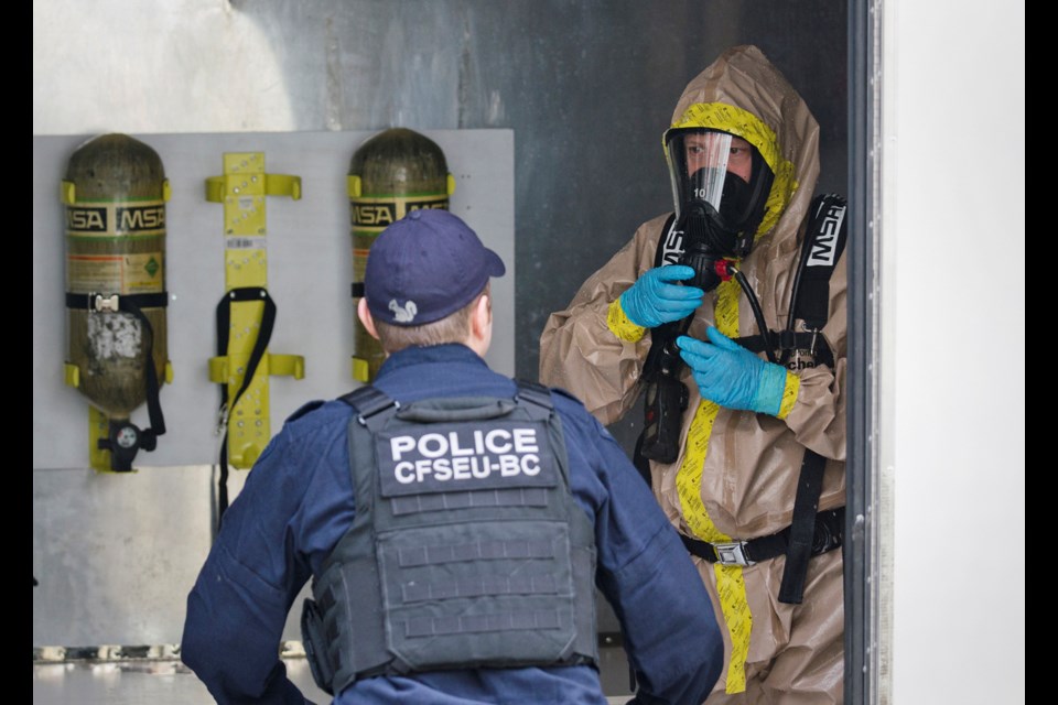 Members of the RCMP’s CLEAR (Clandestine Laboratory Enforcement and Response) team along Burnaby firefighters spent Friday cleaning up a fentanyl drug lab in a townhouse complex in the 6800 block of Prenter Street.