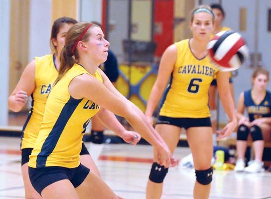 West Vancouver's Collingwood Cavaliers #4 Alex Eby in action against the Sunshine Coast's Elphinstone Cougars in Div 1 Volleyball final held at Carson Graham.