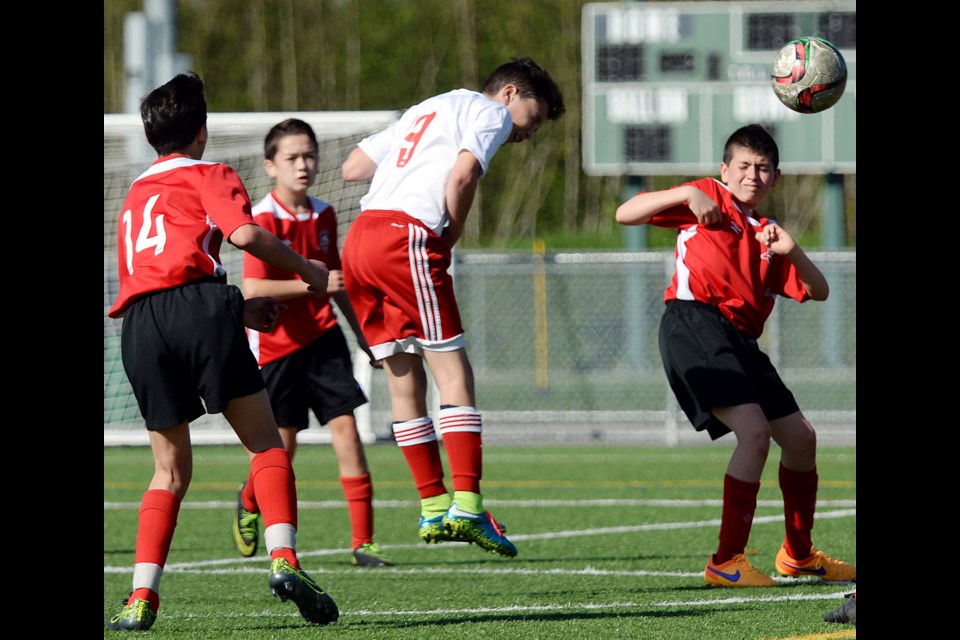Burnaby Metro Selects striker Joey Cannova heads the ball during last week’s Coastal A Cup under-13 quarterfinal at Burnaby Lake West. Burnaby prevailed 2-0 over Port Moody to advance to this week's semifinal.