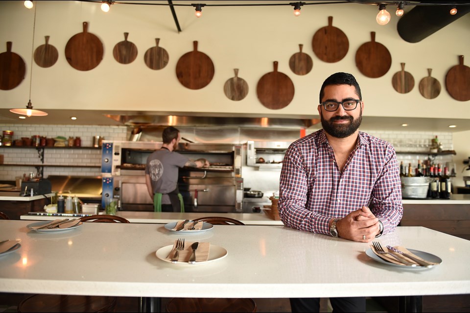 James Iranzad and his business partner, Josh Pape, aimed to bring some youth back to the area when they started Bufala, a trendy pizzeria with a liquor license. Photo Dan Toulgoet