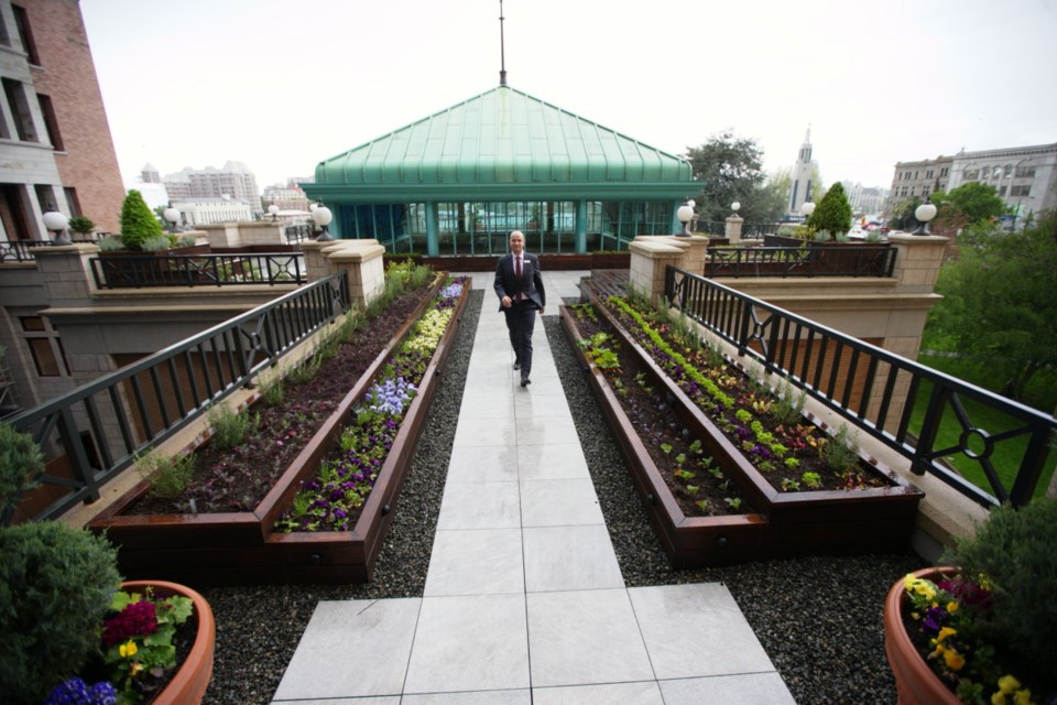 Cole Millen, director of operations for the Fairmont Empress Hotel, in the rooftop garden that will be used by the hotel's chefs.