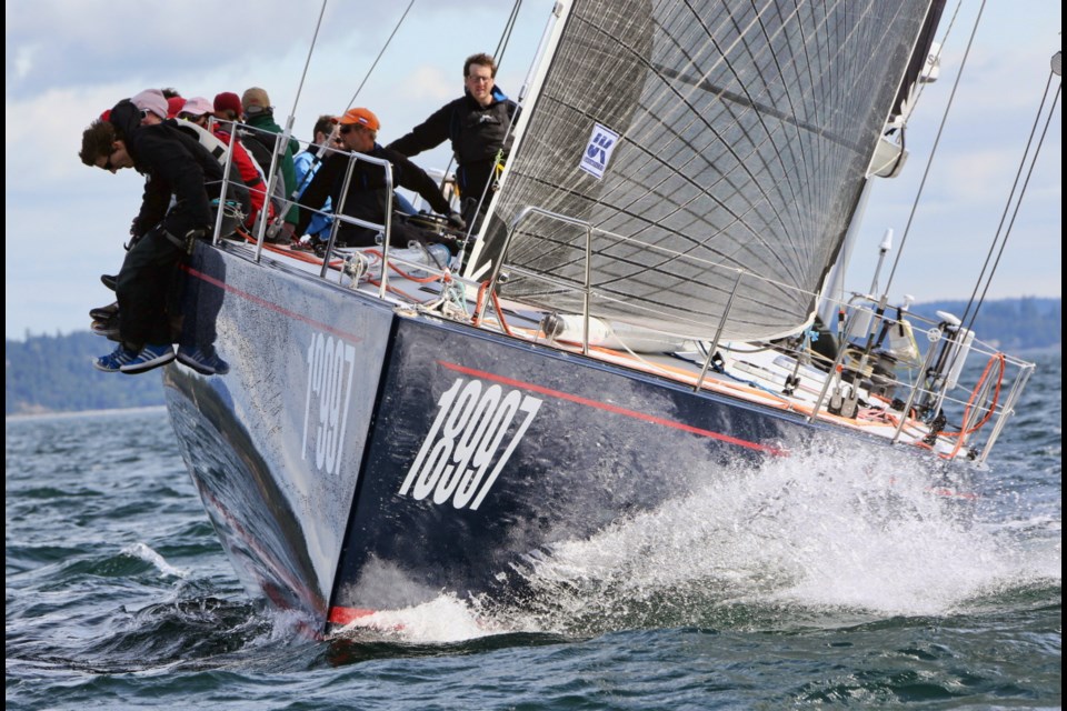 Stuart Dahlgren, right, on his boat Westerly during the 2014 Swiftsure.