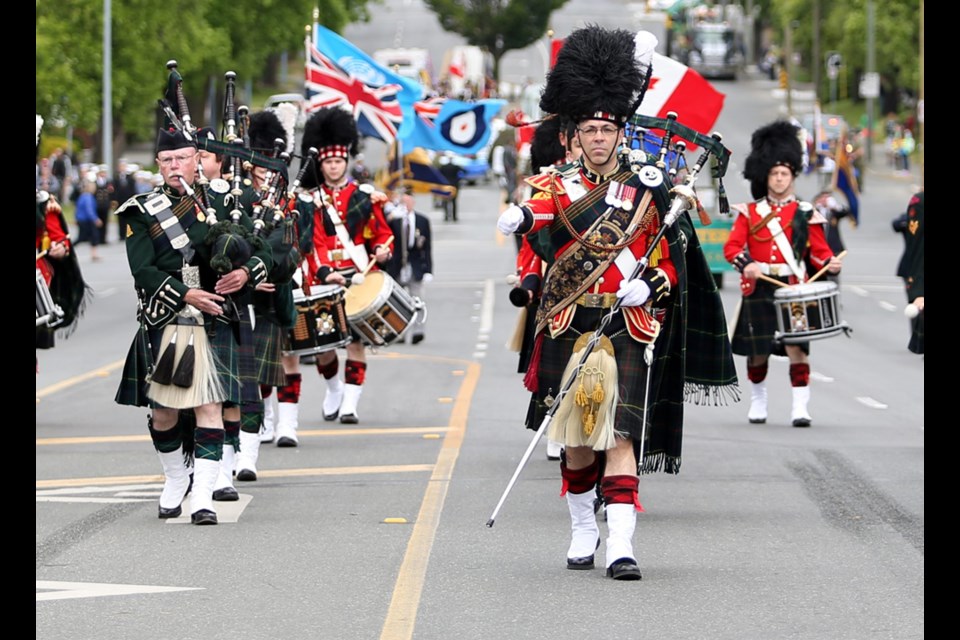 Canadian Scottish Regiment Pipes & Drums moving up Douglas Street at the Victoria Day Parade, May 23, 2016. Photograph by BRUCE STOTESBURY, Times Colonist