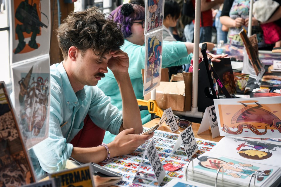 JJ McCullough was just one of the many local cartoonists participating in the fifth annual 鶹ýӳComic Arts Festival at the Roundhouse Community Centre this past weekend. Photograph by: Rebecca Blissett