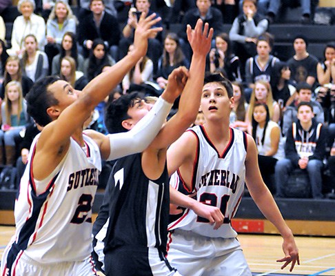 Sutherland (white) and Elphinstone (blue) in Junior Boy's championship game at Sutherland Secondary.