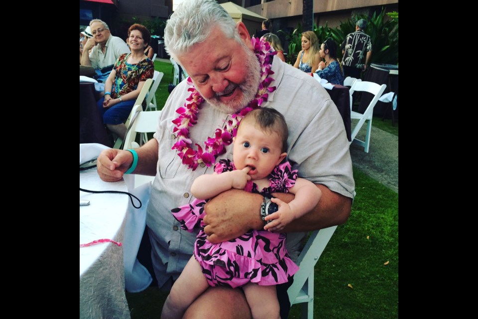 Our granddaughter Hazel enjoying her first luau on a family vacation to Kauai. Photo Sandra Thomas