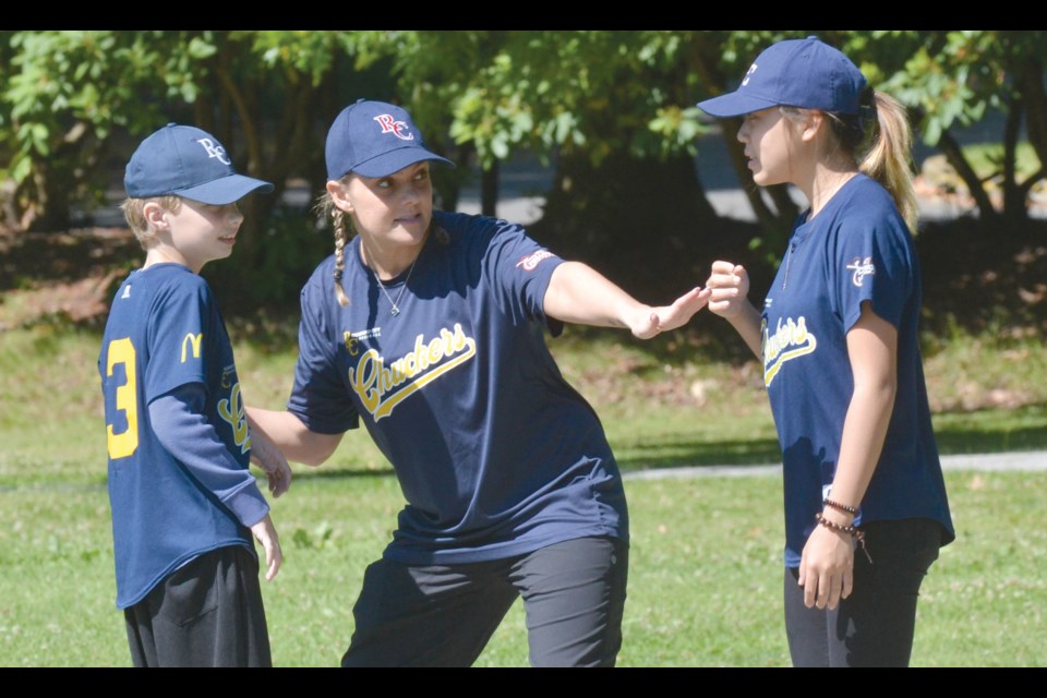 Shauna Parnell (centre) and young volunteers are a huge part of RCBA’s Challenger program.