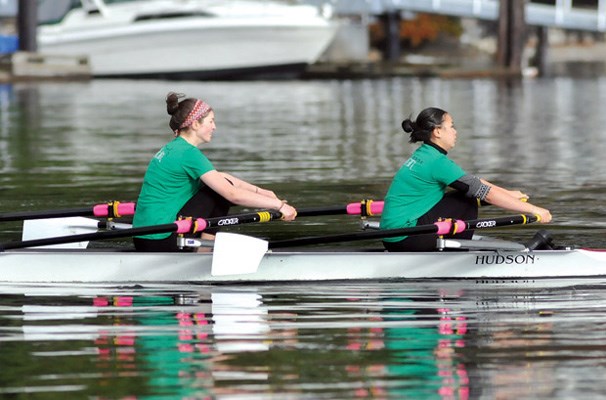 Argyle senior girls doubles team Sara Dalsanto (left) and Chantelle Chow row to the finish line during the High School Rowing Regatta in Deep Cove.