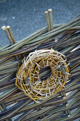 Woven details hang thoughout the garden.