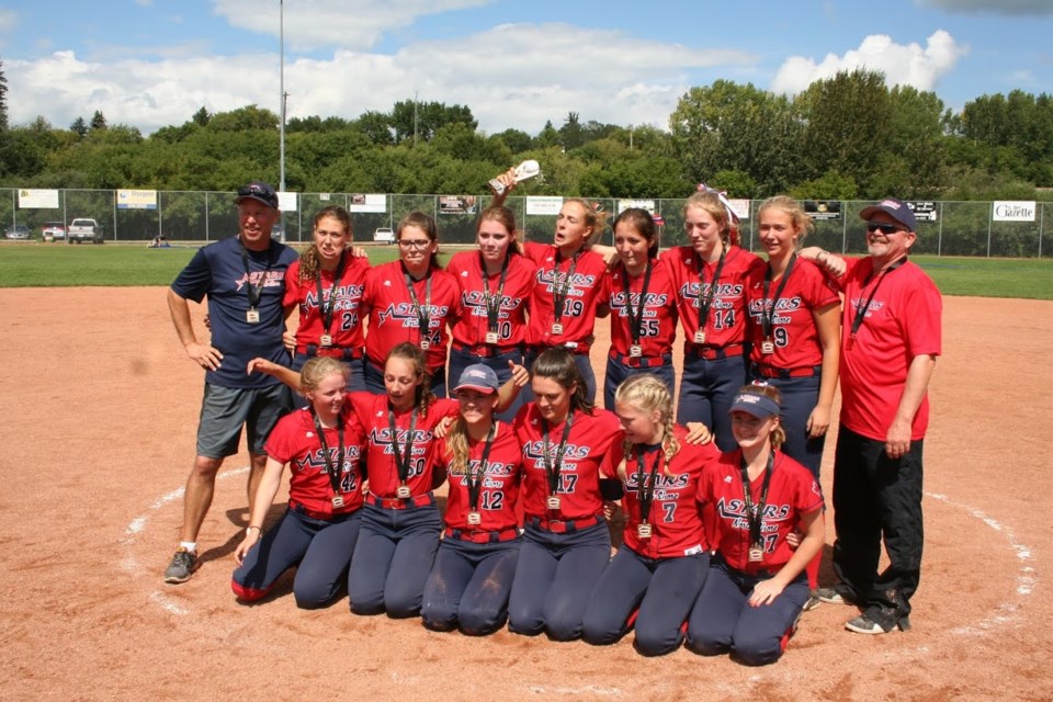 Members of the North Shore Stars 2000 Rep B fastpitch team celebrate their win at the Western Canadian Championships. photo supplied