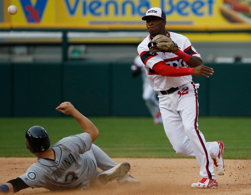 Tim Anderson, Mike Zunino.jpg