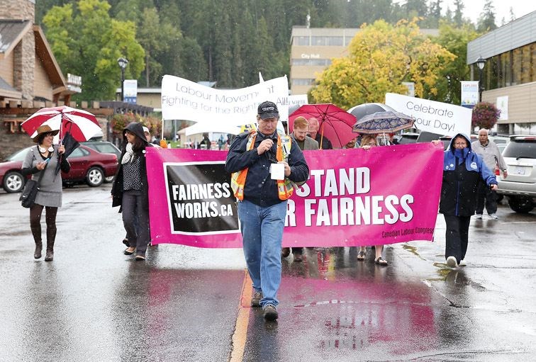 The rain was not a deterrent for the nearly one hundred people who participated in a march through downtown Prince George on Monday as part of Labour Day celebrations that took place on the lawn at city hall. Citizen Photo by James Doyle       September 5, 2016