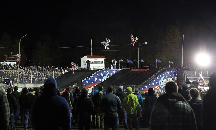 Riders perform a trick during Nitro Circus Live which took place on Friday at PGARA Speedway. Citizen Photo by James Doyle September 16, 2016