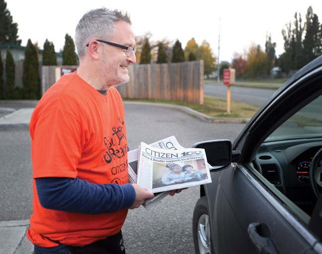 Paul Burry raising funds for Raise A Reader at the Tim Hortons on 15th Avenue. Citizen photo by Brent Braaten Sept 28 2016