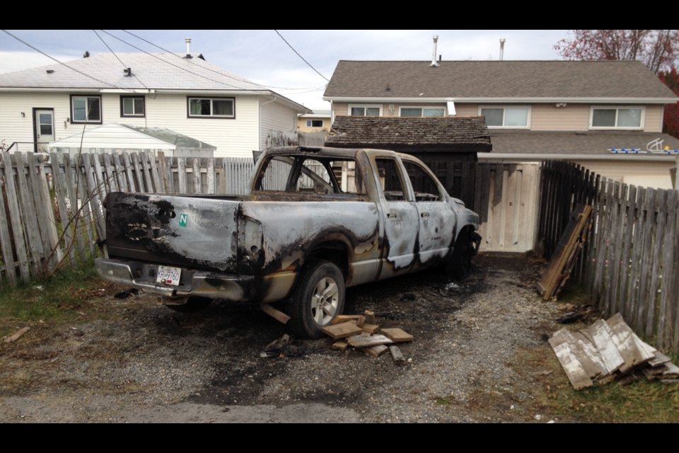 A pickup truck parked at a 700-block Gillett Street home went up in flames under suspicious circumstances shortly after midnight Thursday.