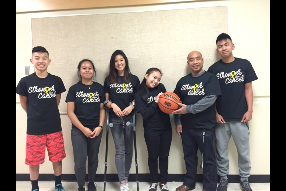 MacNeill secondary teacher Lauren Valiquette (third from left) is hoping for a big turnout for the third annual Strong Than Cancer fundraiser on Nov. 28, which coincides with the school’s home openers for basketball.