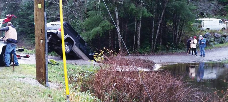 This SUV took a turn for the worse when the driver pulled onto Belair Road on Nov. 25, shortly after a portion of the road was washed away by a sudden flood due to a broken beaver dam near Trout Lake. The driver was uninjured and a tow truck was called to pull the vehicle back onto the roadway.