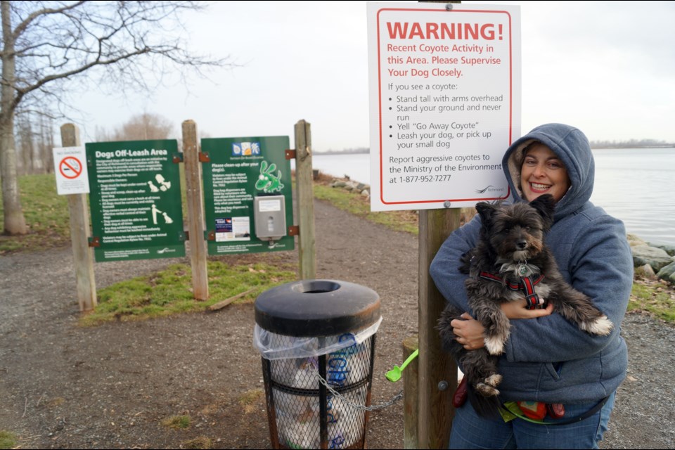 Isabel Huenefeld, of Nosey Woofies dog walking, says people are feeding coyotes, leading to increased interactions with pets and humans in south Richmond and Steveston. The City of Richmond has a warning sign (above) at the No. 3 Road off-leash park. Photo by Graeme Wood/Richmond News