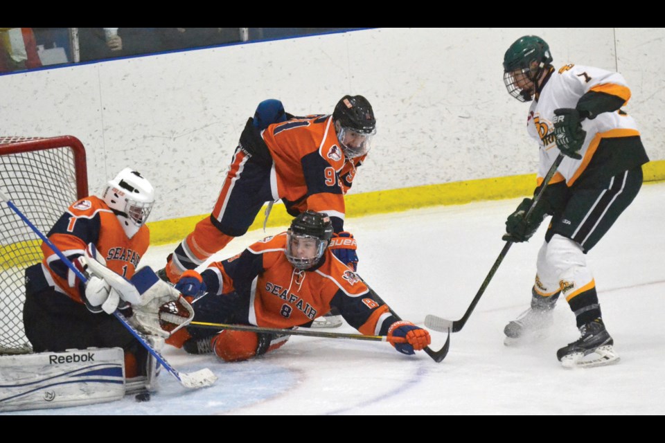 Seafair Islanders goalie Max Abah turns away South Delta’s Mike Matson during the Midget Tier One championship game at the 36th annual Richmond International Bantam Midget Hockey Tournament. The Islanders lost 4-3 in overtime.