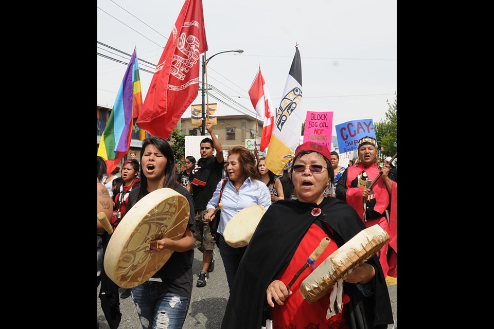 Members of the aboriginal community took to the streets Thursday to protest the federal government's plan to realign 14 youth programs.