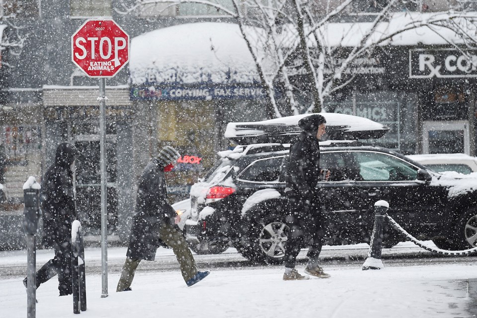 The snow started early Friday morning for what's expected to be a wintery weekend. Photo Dan Toulgoet