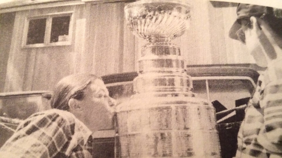 Cherly-Anne Riley kisses the Stanley Cup