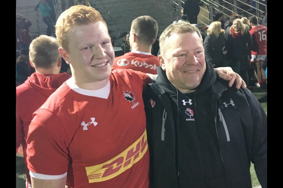 George Barton of Duncan celebrates with dad Bruce after the Test victory over Chile at Westhills Stadium.