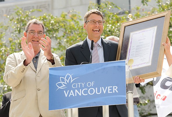 Mayor Gregor Robertson helps kick-off of Pride and the North America Outgames at city hall Monday.