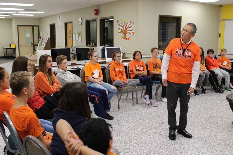 Residential school survivor Grant Queskekapow addressed a room full of Grade 8 students at Westwood School on Sept. 29.