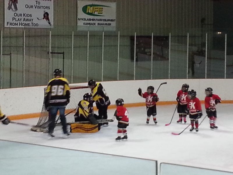 To even the playing field, Shaun Lawless, a parent, was put in goal position for the squirts team.