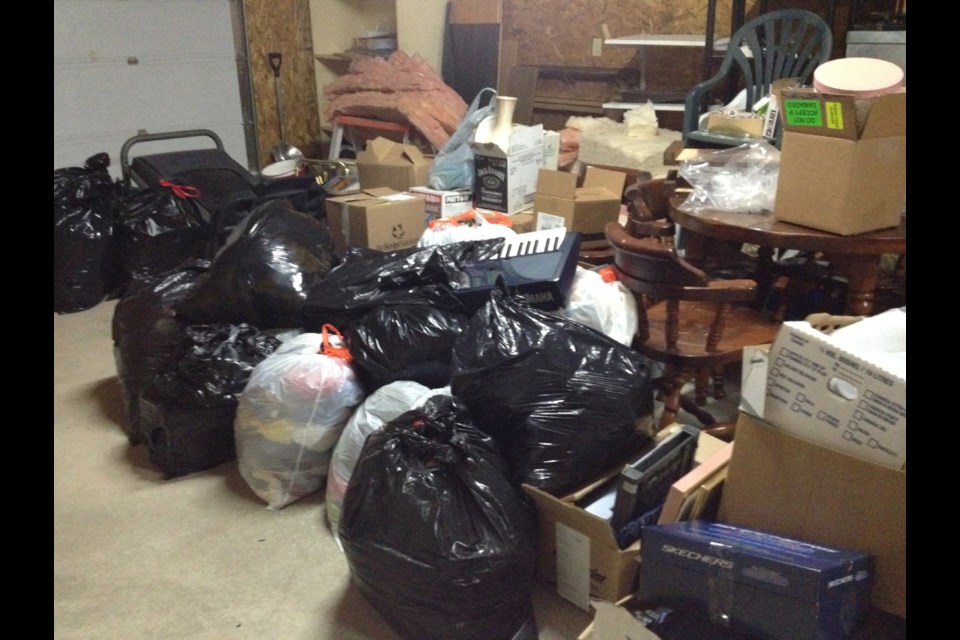 Elaine Brewer's garage was overflowing with clothes and household goods.