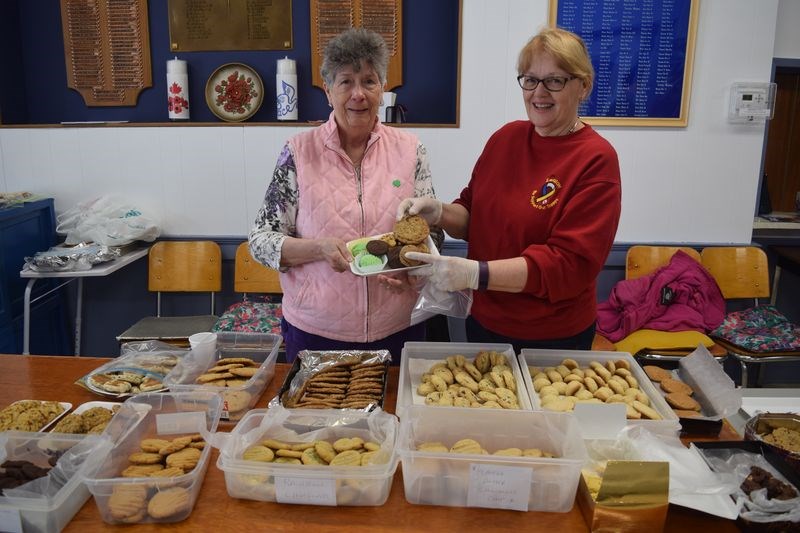 Tending the cookie walk table at the spring trade show held at the Kamsack Legion Hall on March 18 were Audrey Girling, left, and Judy Green of Kamsack.