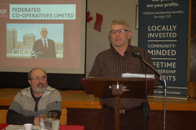 Herb Carlson, vice-president of the Gateway Co-op, presented a report from Federated Co-op Ltd. Carlson also announced his retirement after 42 years with the Co-op. From left, were: Bob Lebo, appointed chairperson, and Carlson.