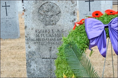 Attendees of the ceremony honouring pilot Maxwell Cassidy pinned poppies to a wreath in remembrance. The memorial was held in North Battleford City Cemetery April 25, Anzac Day, which commemorates Australian and New Zealand veterans. Photos by Shannon Kovalsky