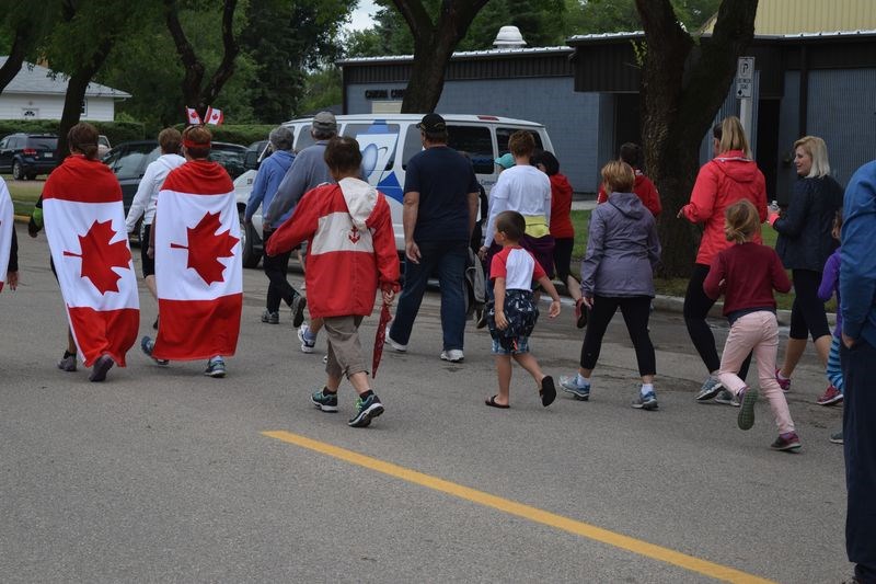 They weren’t quite as fast as the runners, but a number of enthusiastic walkers participated in the 5K run/walk on July 22.