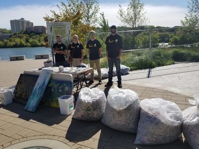 EcoGenX of Canora sponsored the successful Silver for Gold fundraising effort on September 10 in Saskatoon. Dallon Leger, owner, said they collected 990 pounds of pop can tabs, pictured, which raised over $600 for pediatric cancer research. From left are: Mathew Dawe and Brooke Switzer, employees; Leger, and James Stevely, employee.