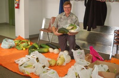 Rev. Miles Russell showcased some of the many vegetables that were brought in during the veggie exchange involving the participating communities of Sturgis, Preeceville and Endeavour.