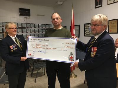 A cheque in the amount of $6,550 was presented to Barry Golay (centre) by Kamsack Legion members Judy Green and Jim Woodward after the benefit supper held at the Legion on September 17.