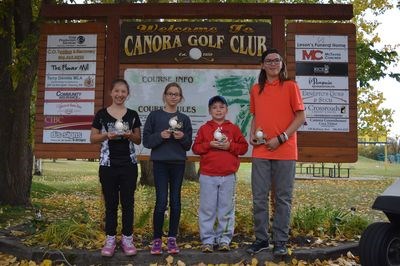 From left, the winners of the Big N’ Little golf tournament held on September 29 at the Canora Golf and Country Club were: Tia Bushell (junior girls), Abby Wilson (senior girls), Colton Bletsky (junior boys) and Toby Olynyk (senior boys).