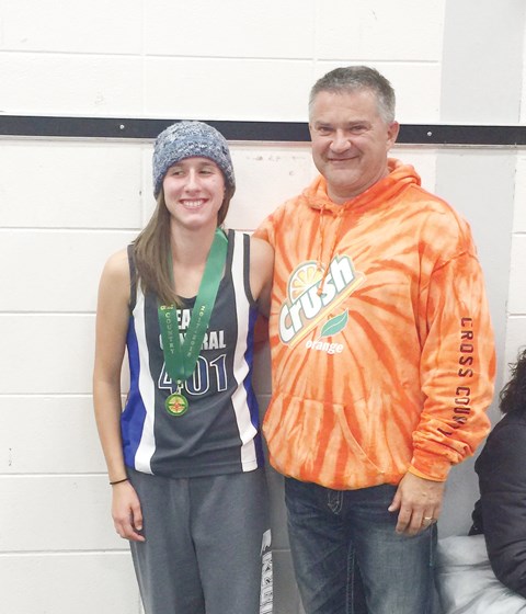 Zoe Flaman and coach Mike Haczkewicz celebrate her gold medal victory after the race.