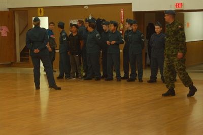 Jordan Lowe, left, and Capt. Troy Rogowski oversaw the drill formation of new and returning cadets.