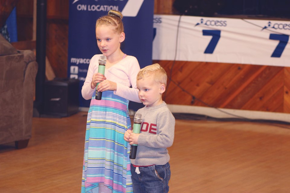 Kathryn Orlowski, left, and Emeris Orlowski sang during the telethon.