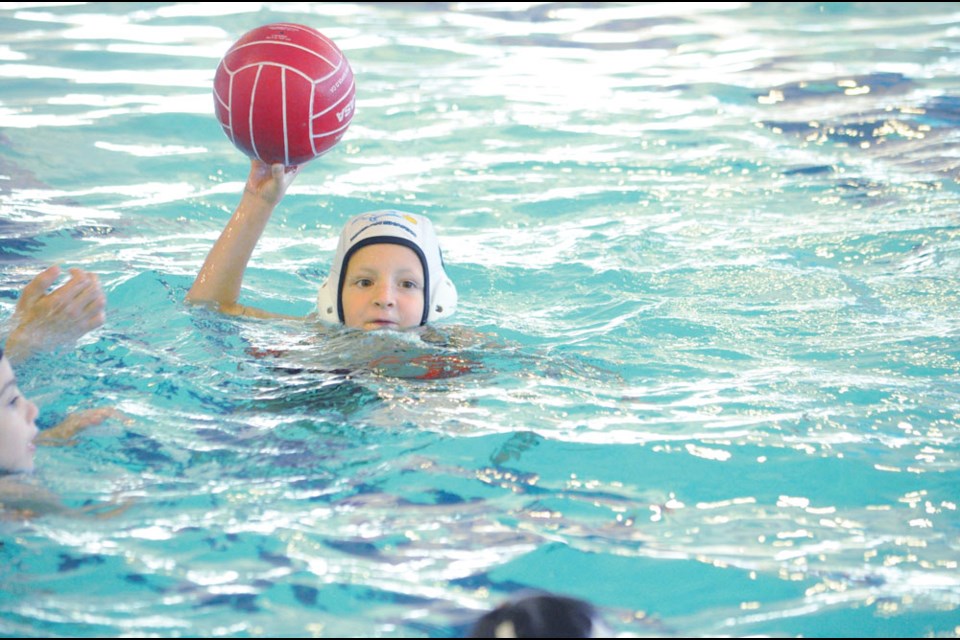 Hayden Baniulis of the Sharks Blue team looks for a pass Sunday at the RM of Estevan Aquatic Centre (Corey Atkinson photo)