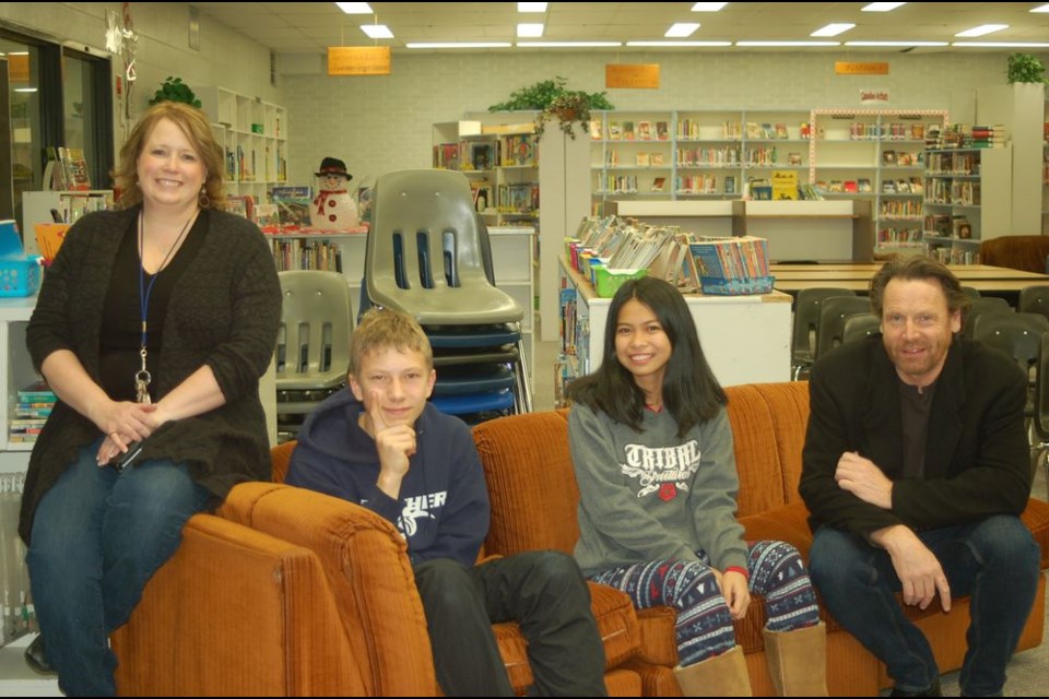 The Preeceville School featured a literacy evening with its writer-in-residence Sigmund Brouwer. From left, were: Leslea Hanson, Erik Sandager, Janhia Irlandez and Brouwer.