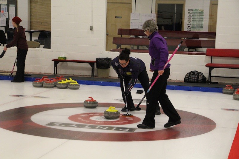 Deana Schenher and Kristina Jest were in the house at the Iron Man Curling Bonspiel, the first time the variation was played in Yorkton.