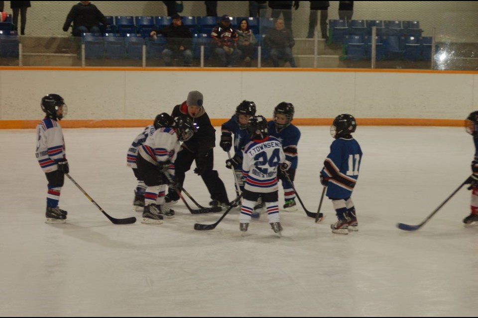 At a face-off for the Preeceville IP hockey game, from left, were: Levi Coleman, Bennett Halkyard, Dillon Serdachny and Tanner Townsend. Wyatt Anaka dropped the puck.