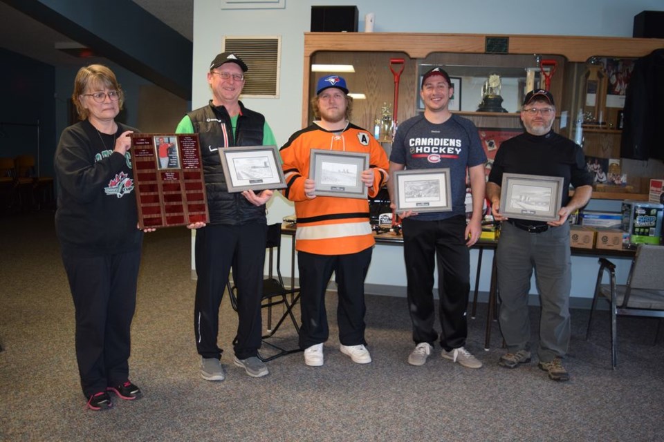 Patty Kolodziejski, daughter of Ted Palagian, presented the Ted Palagian memorial plaque and four art prints to the Bob Kolodziejski rink for winning rink the A event at the Canora Men’s Bonspiel, which took place from March 21-25. From left, are: Patty Kolodziejski, Bob Kolodziejski (skip), Sean Kolodziejski (third), Bryan Kolodziejski (second), and Robin Ludba (lead).