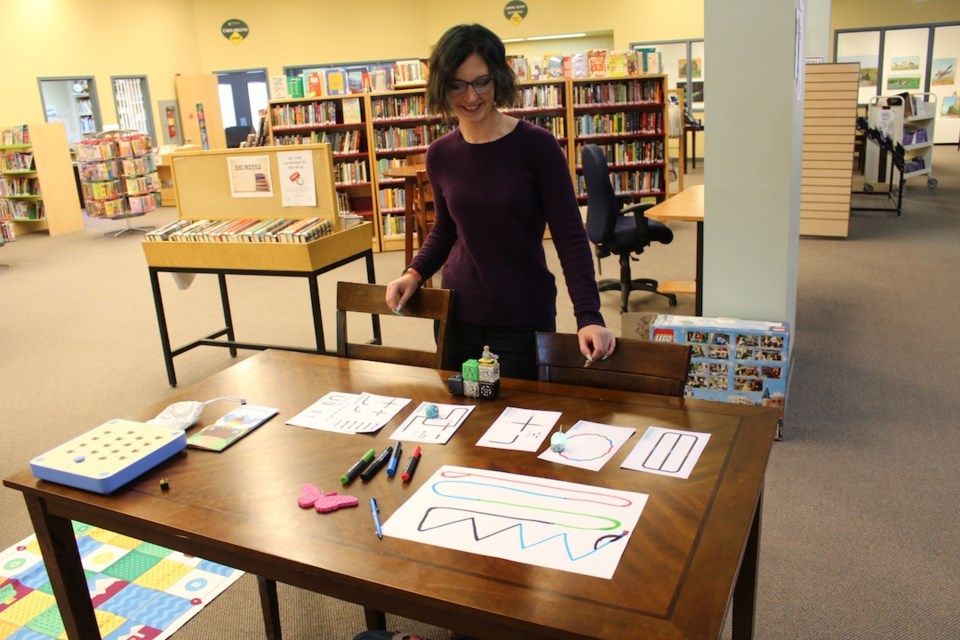 The Yorkton Public Library now has a “Maker Space.” Here head librarian Meagan Richards shows off the Cubelets and Ozobots.