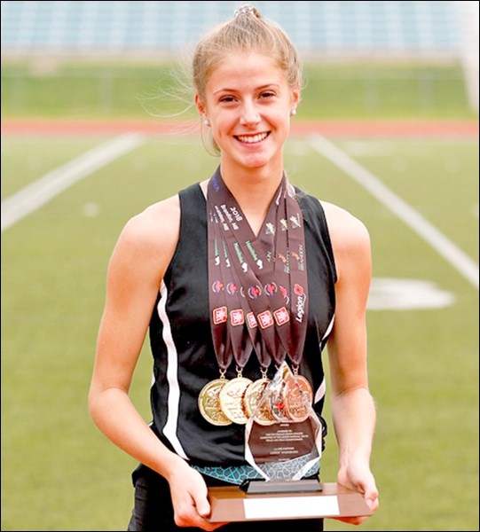 Savannah Sutherland with medals and award earned at the Legion National Track and Field Meet. Photo submitted by Lorraine Olinyk