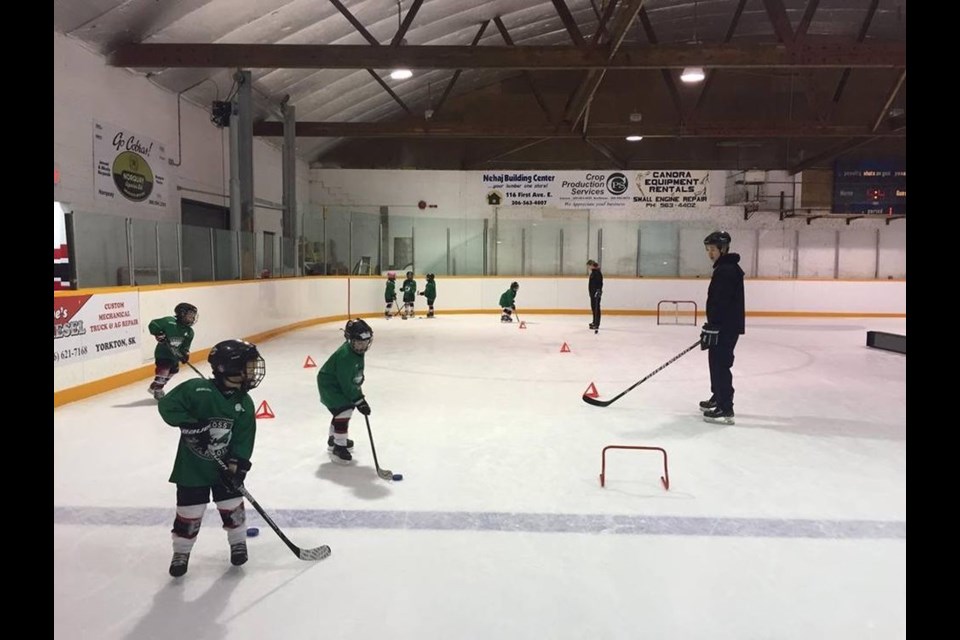 Players from the Canora Cobras IP team took part in skills competitions during the SHA (Saskatchewan Hockey Association) IP Cross Ice Jamboree held at the Canora Civic Centre on December 16. From left, were: Karter Shukin, Drew Kitchen, Yuri Olynyk, Courtlyn Heshka, Kenzee Kopelchuk, Angel Sliva, Odin Fullawka, coach Leona Kitchen and an SHA representative.